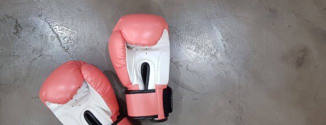 pair of pink boxing gloves